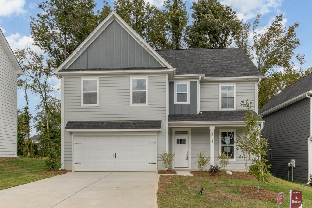 Simfield Valley, vertical construction, Holly Grove townhome development Charlotte, Red Cedar Construction Services logo